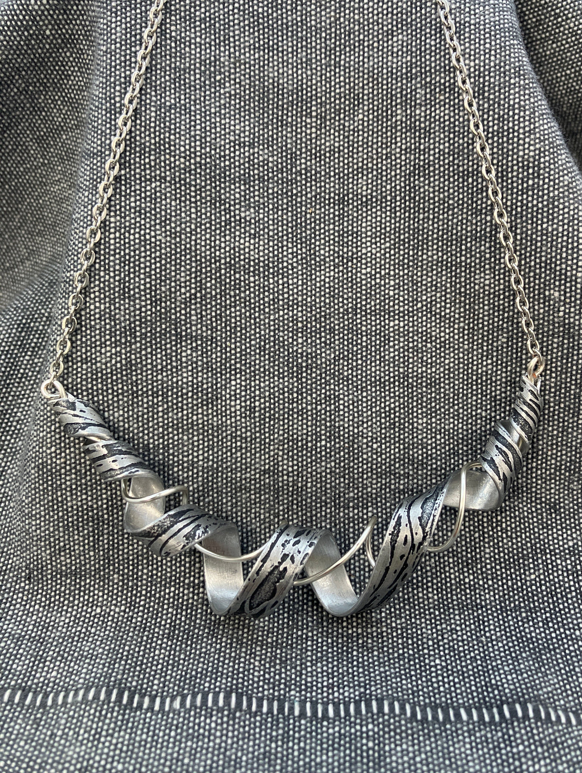 Out Of Line Black Wave Necklace